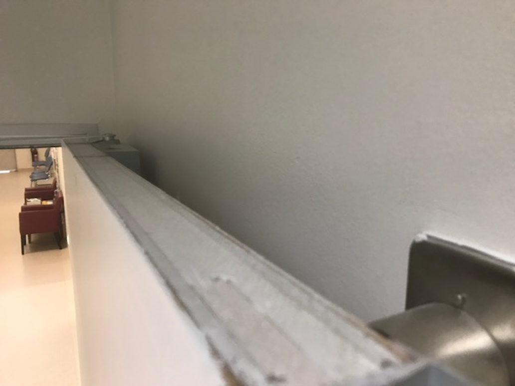 Fire door from 1982 Needs to be cut for floor clearance